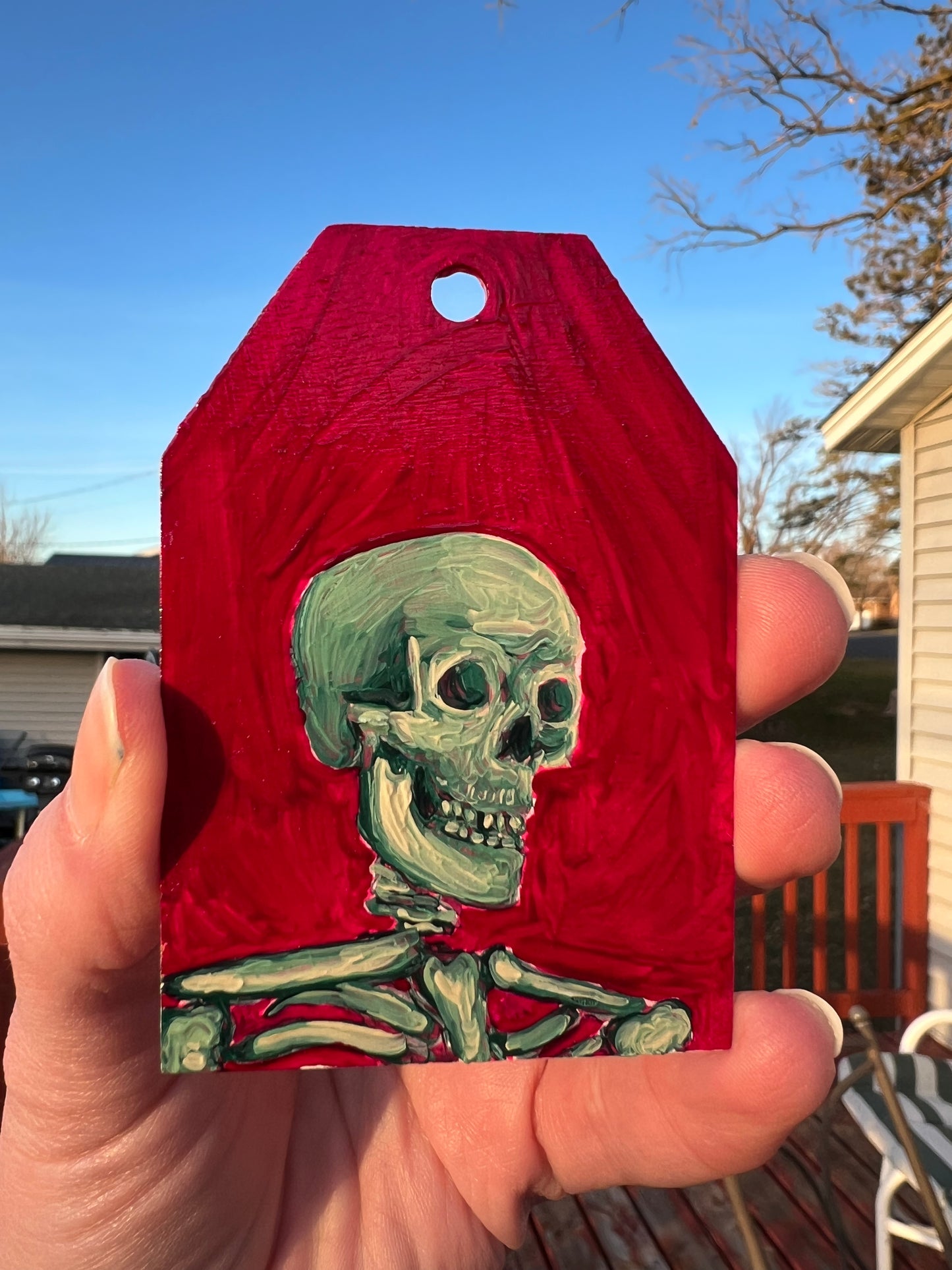 Red and forest green skeleton ornament